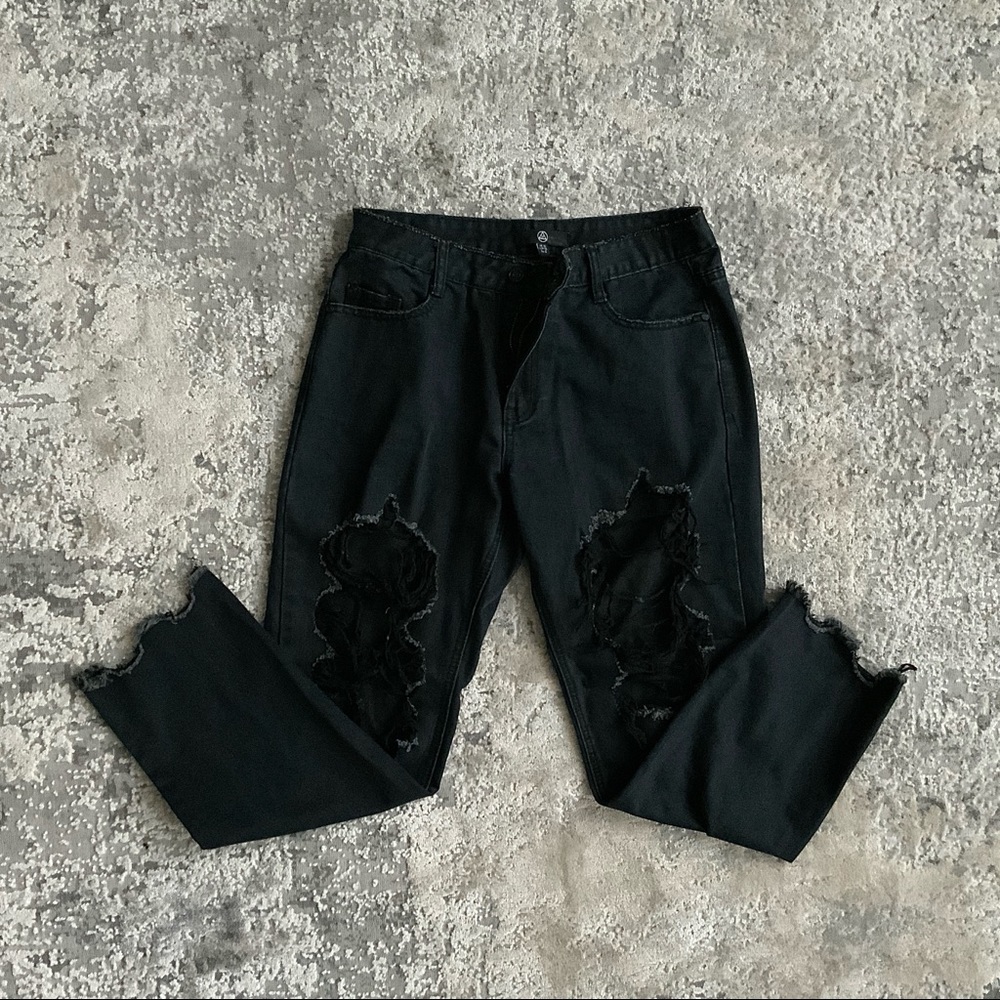 black ripped jeans